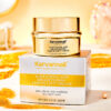 Cosmetic cream jar with gold cap on a white background